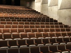 photography of theater chairs